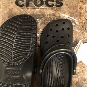 Crocs. Black. New, never worn. Size 7 women’s.